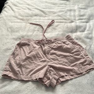 Very light pink and they are in good condition though they have been worn.